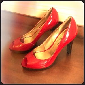 Red peep toe pumps